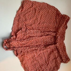 orange and white paper bag shorts